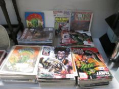 A large collection of Judge Dredd and 2000AD comics