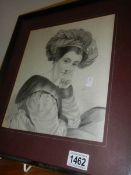 A framed and glazed study of a young lady.