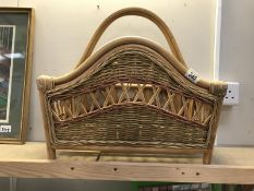 A bamboo and cane magazine rack