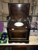 A vintage commode with china insert