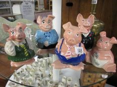 A set of 5 Wade Nat West pigs money boxes