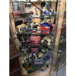 A quantity of diecast vehicles over 6 (small) shelves