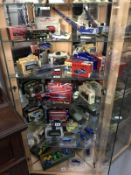 A quantity of diecast vehicles over 6 (small) shelves