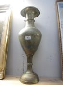 A tall Indian brass vase