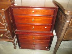 2 dark wood stained chest of drawers