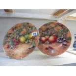 A pair of studio hand painted plates depicting still life/fruit Signed DRB