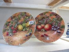 A pair of studio hand painted plates depicting still life/fruit Signed DRB