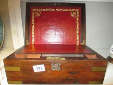 A Victorian rosewood veneered brass bound writing box