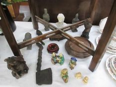 A mixed lot of pottery and wood ornaments including Chinese, ethnic etc.