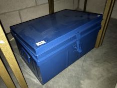 A blue metal trunk