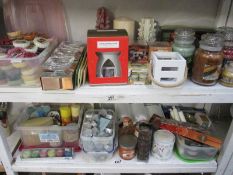 2 shelves of candles, including a large lot of Yankee candles, melt tarts etc.