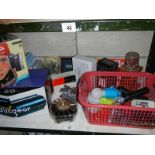 A pair of speakers, cd holder, quantity of sealed dvds, torches/lights (with batteries) etc.