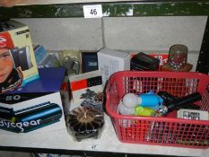 A pair of speakers, cd holder, quantity of sealed dvds, torches/lights (with batteries) etc.