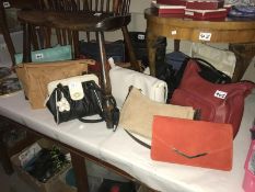 A collection of ladies handbags