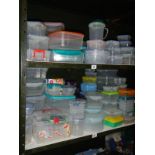 2 shelves containing a large lot of storage boxes (kitchen/garage)