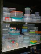 2 shelves containing a large lot of storage boxes (kitchen/garage)