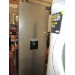 A Grundig fridge freezer with water dispenser