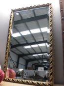 A gilt framed bevel edged mirror