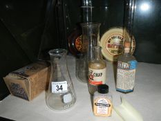 A quantity of chemist glass items etc.