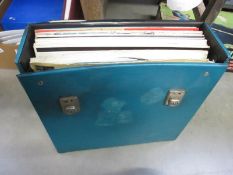 A record case of LP's including Rex Harrison, George Formby etc.