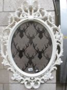 A plastic framed decorative picture frame