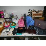 A shelf of ladies bags, manicure sets, toiletries etc.