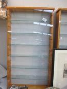 A pine diecast collectors display cabinet
