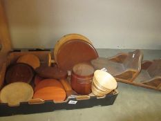 A quantity of wooden items including numerous stands