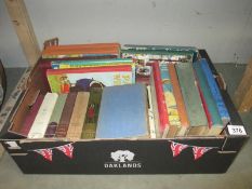 A box of vintage children's books