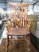 A farmhouse carver chair