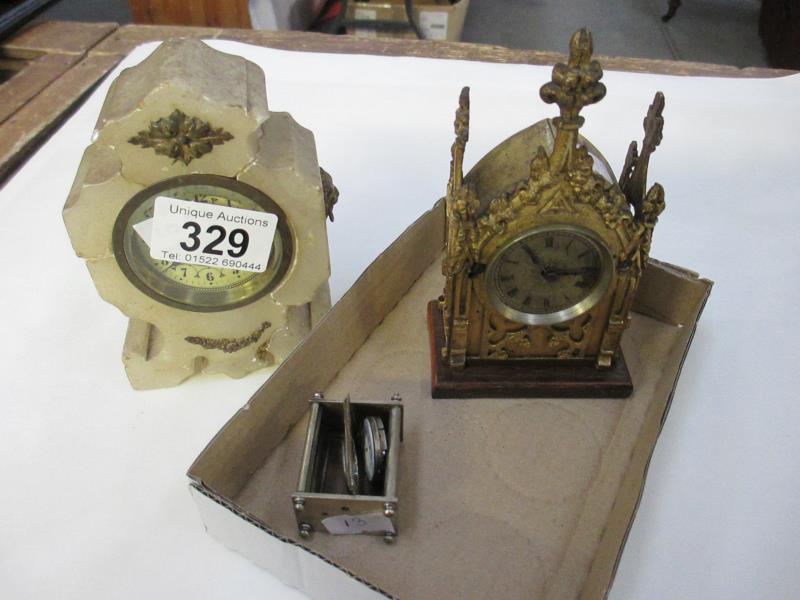 A brass clock and 2 others a/f