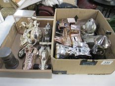 A box of silver plate money boxes