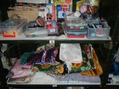 2 shelves of sewing related items and fabric