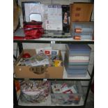 3 shelves of craft work items including a large amount of crafting paper