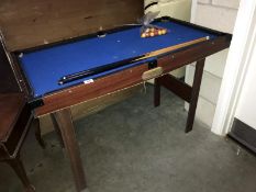 A child's snooker table and 2 cues