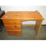 A pine 3 drawer single pedestal office desk