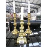 A pair of Victorian brass candlesticks and 2 others