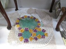 A quantity of vintage crocheted doilies