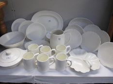 A large quantity of white dinner ware etc.