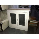 A 2 door glazed kitchen cupboard