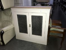 A 2 door glazed kitchen cupboard