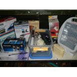 A quantity of electrical items including irons, hair dryers, heater etc.
