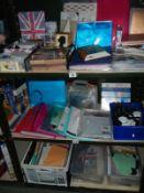 3 shelves of craft work items including stamps paper etc.