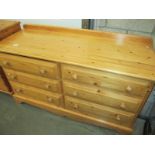 A solid pine 6 drawer chest of drawers