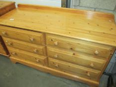 A solid pine 6 drawer chest of drawers