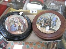 A pair of 19th century Prattware framed pot lids