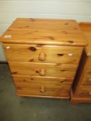 A solid pine 3 drawer chest of drawers