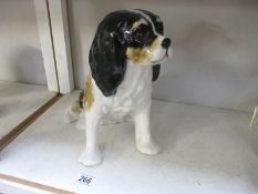 A large figure of a King Charles spaniel