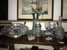A decanter/jug with silver plate top, 2 other decanters, punch bowl etc.