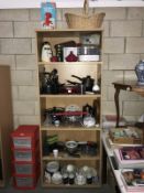 6 shelves of kitchenalia including wicker shopping basket, Pyrex dishes etc.